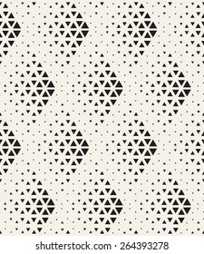 Vector seamless pattern. Modern stylish texture. Repeating geometric tiles with dotted triangles. Regular hipster background. Small triangles form halftone rhombuses. Contemporary simple ornament