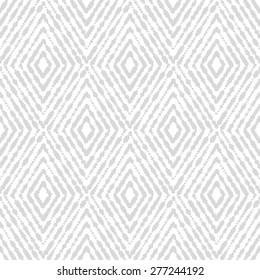 Vector seamless pattern. Modern stylish texture with rhombuses. Repeating geometric tiles. White and gray texture.