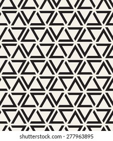 Vector seamless pattern. Modern stylish texture. Repeating geometric tiles with striped triangles. Trendy hipster background.