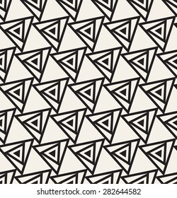 Vector seamless pattern. Modern stylish texture. Repeating geometric tiles with rotated triangles.