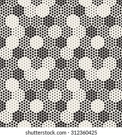 Vector seamless pattern. Modern stylish texture. Repeating geometric tiles with filled dotted hexagons. Regular hipster background. Small circles form hexagonal minimalistic ornament.