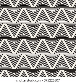 Vector seamless pattern. Modern stylish texture. Repeating geometric tiles from striped triangles.