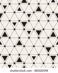 Vector seamless pattern. Modern stylish texture. Repeating geometric background with triangular linear grid. Randomly disposed black filled triangles. Monochrome graphic design.