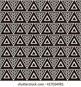 Vector seamless pattern. Modern stylish texture. Repeating geometric tiles with striped triangles. Hipster monochrome print. Trendy graphic design.
