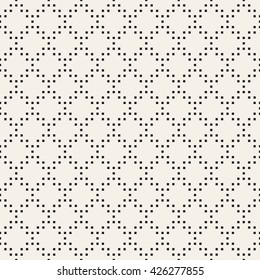 Vector seamless pattern. Modern stylish texture. Repeating geometric tiles with dotted rhombuses.