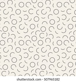 Vector seamless pattern. Modern stylish texture. Repeating abstract background with random elements. Trendy hipster print with rings..