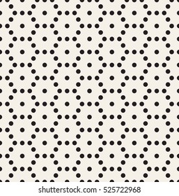 Vector seamless pattern. Modern stylish texture. Repeating geometric tiles with filled dotted hexagons. Regular hipster background. Small circles form hexagonal minimalistic ornament.