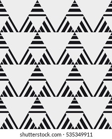 Vector seamless pattern. Modern stylish texture. Repeating geometric tiles. Composition with striped triangles.