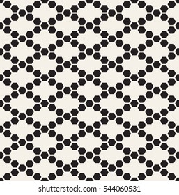 Vector seamless pattern. Modern stylish texture. Repeating geometric tiles with dotted rhombuses. Regular hipster background. Hexagons form simple minimalistic ornament.