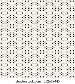 Vector seamless pattern. Modern stylish texture. Repeating geometric tiles with dotted triangles. Trendy hipster background. Small circles form triangular minimalistic ornament.