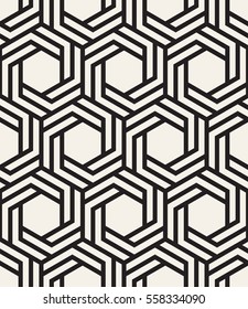 Vector seamless pattern. Modern stylish texture. Repeating geometric tiles with hexagons. Chevron elements form stylish tileable print.