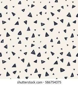 Vector seamless pattern. Modern stylish texture.  Hipster simple design with randomly disposed triangles.