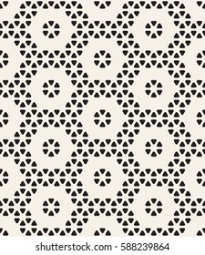 Vector seamless pattern. Modern stylish texture. Repeating geometric tiles. Triangles on hexagonal grid.