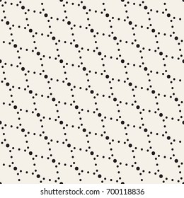 Vector seamless pattern. Modern stylish texture. Repeating geometric tiles with dotted rotated rhombuses.