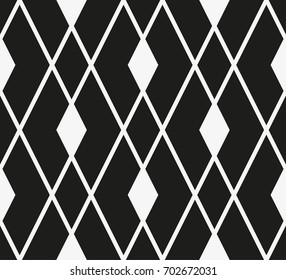 Vector seamless pattern. Modern stylish texture. Repeating geometric tiles with a grid of rhombuses.