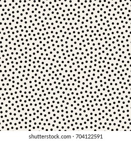 Vector seamless pattern. Modern stylish texture with randomly disposed circles. Repeating abstract background with chaotic small dots. Stylish hipster print.