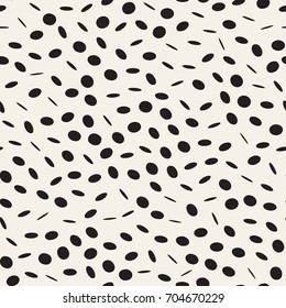Vector seamless pattern. Modern stylish texture with randomly disposed circles. Repeating abstract background with chaotic small dots. Stylish hipster print.
