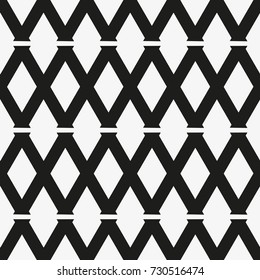 Vector seamless pattern. Modern stylish texture. Repeating geometric tiles with a grid of rhombuses.
