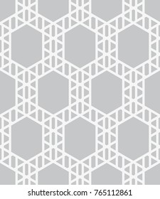 Vector seamless pattern. Modern stylish texture. Repeating geometric tiles with hexagons and triangles.