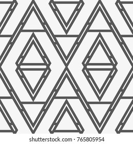 Vector seamless pattern. Modern stylish texture. Repeating geometric tiles with a grid of rhombuses.