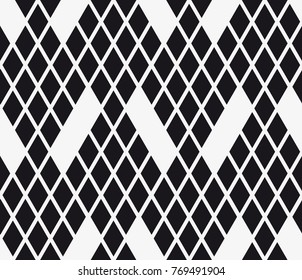 Vector seamless pattern. Modern stylish texture. Repeating geometric tiles with a grid of rhombuses.