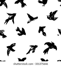 Vector seamless pattern with monochrome birds. Ink background with sparrows, swallows, crowns and seagulls. Watercolor wallpaper with birds silhouettes.