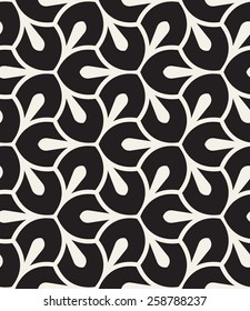Vector seamless pattern. Monochrome graphic design. Decorative geometric leaves. Regular floral background with elegant petals. Modern stylish ornament.