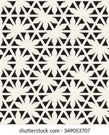 Vector seamless pattern. Monochrome graphic design. Decorative geometric leaves. Regular floral background with elegant petals. Modern stylish ornament.