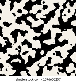 Vector seamless pattern. Monochrome organic shapes. Stylish structure of natural spots. Hand drawn abstract background. Can be used as swatch in Illustrator. Camouflage spotty monochrome print.