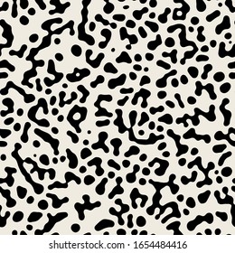 Vector seamless pattern. Monochrome organic shapes. Stylish structure of natural spots. Hand drawn abstract background. Can be used as swatch in Illustrator. Camouflage spotty monochrome print.