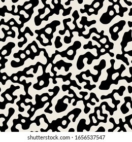 Vector seamless pattern. Monochrome organic shapes. Stylish structure of natural spots. Hand drawn abstract background. Can be used as swatch in Illustrator. Camouflage spotty monochrome print.