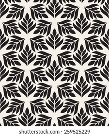 Vector seamless pattern. Monochrome ornament with stylized leaves disposed on hexagonal grid. Geometric stylish background. Vector repeating texture. Modern graphic design.