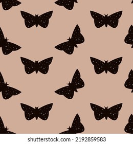 Vector seamless pattern with moth or black butterfly design.
Trendy texture for print, textile, packaging. 