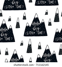 Vector seamless pattern with mountains and hand drawn letters. Dream big little one. Black and white background.