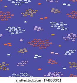 Vector seamless pattern with multicolored abstract spots on blue background. Hand draw backdrop for textile, wrapping paper, flat design.