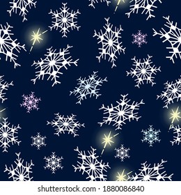 Vector seamless pattern with multicolored snowflakes in different arrangement on dark blue background to decorate new year holiday