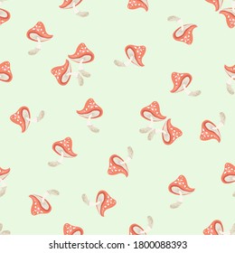 Vector seamless pattern with mushrooms. Cute texture with scattered fly agarics. Forest nature theme. Doodle style drawing illustration. Cartoon background. Repeat design for decor, print, wrapping