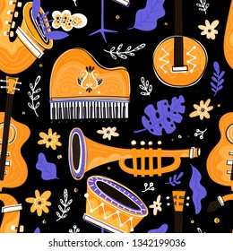 Vector Seamless pattern with music instruments -  trumpet, piano, double bass, saxophone, bass drum and banjo. Perfect for wallpaper, music festival posters and jazz concerts