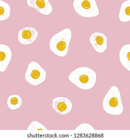 Vector seamless pattern with omelets on the pink background. Hand drawn fabric design. Food illustration.