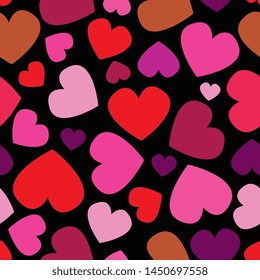 Vector seamless pattern on black background with lila, pink, red, light brown hearts in different directions, retro vintage colors, plastic 3d look