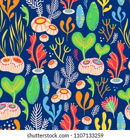 Vector seamless pattern on blue background with seaweed, sea sponges and corals. Abstract illustration with floral elements. Natural design.