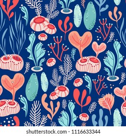 Vector seamless pattern on blue background with seaweed, sea sponges and corals. Abstract illustration with floral elements. Natural design.