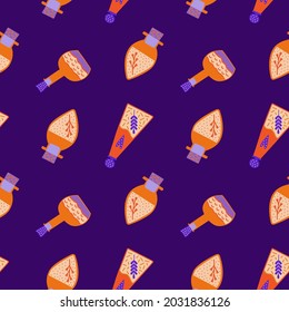 Vector seamless pattern on the theme of Halloween and magic. Orange bottles with potion on dark purple background For printing on fabric, for wrapping paper, for scrapbooking. Digital paper.
