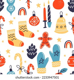 Vector seamless pattern on white isolated background. Mittens and warm socks and hats for winter holidays. Cozy winter texture for gifts, wrapping paper and others.