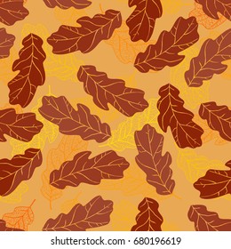 Vector seamless pattern. Openwork colorful autumn oak leaves on orange background. Picture of falling leaves for decoration background on autumn theme.