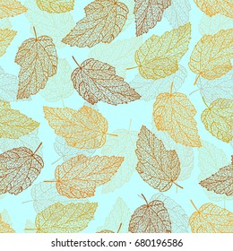 Vector seamless pattern. Openwork fall leaves on a blue background. Picture of falling leaves for decoration background on autumn theme.