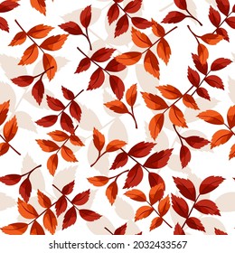 Vector seamless pattern with orange and brown autumn leaves.