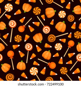 Vector seamless pattern with orange Halloween candies on a black background. 