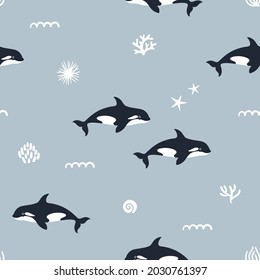 Vector seamless pattern with Orca whales. Sea repeated texture with killer whales. Print for kids fabric and wrapping paper with marine animals. Scandinavian style.