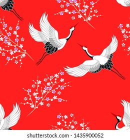 Vector seamless pattern with oriental motifes. Cranes flying. Flower blossom.